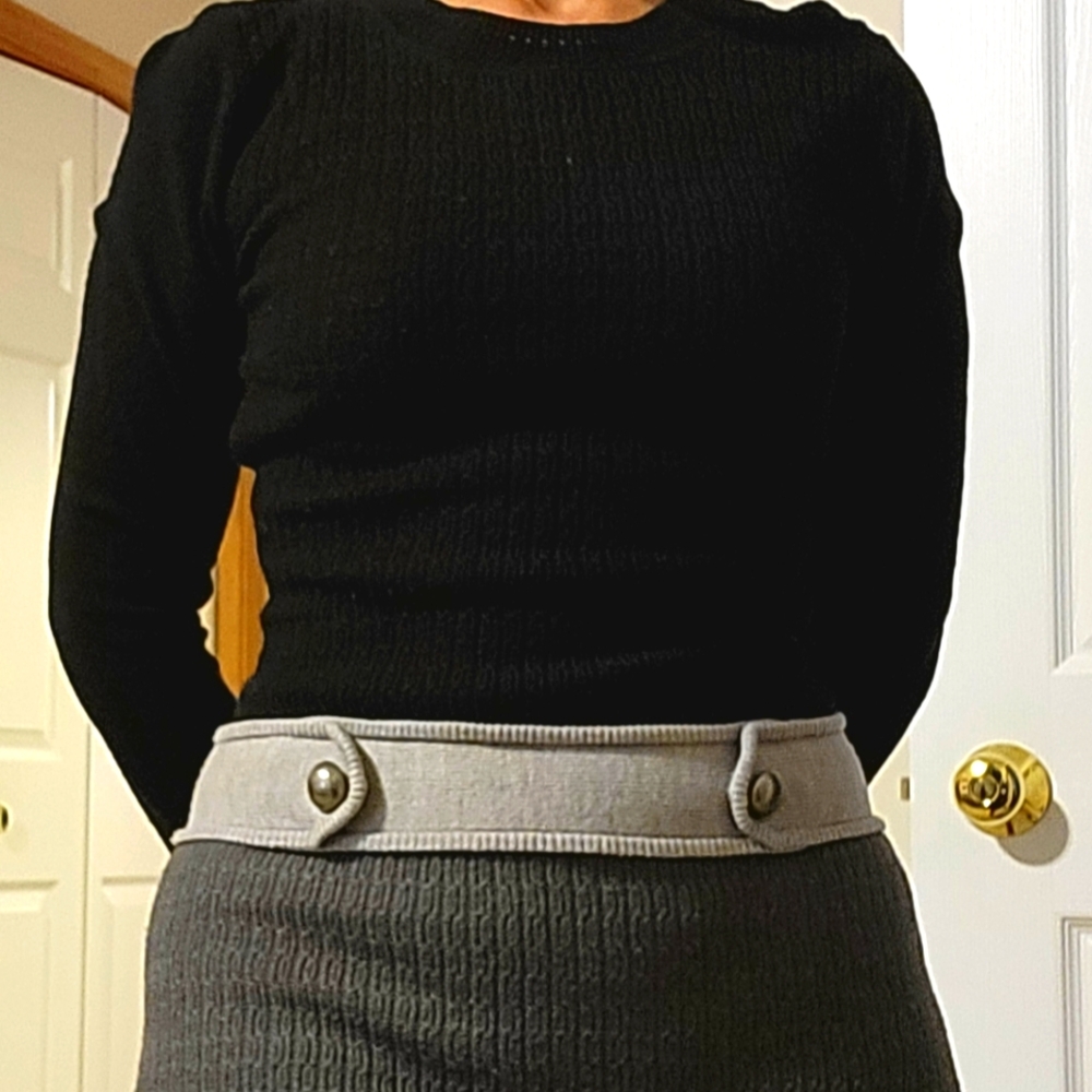 Small sweater dress.  Black and gray.